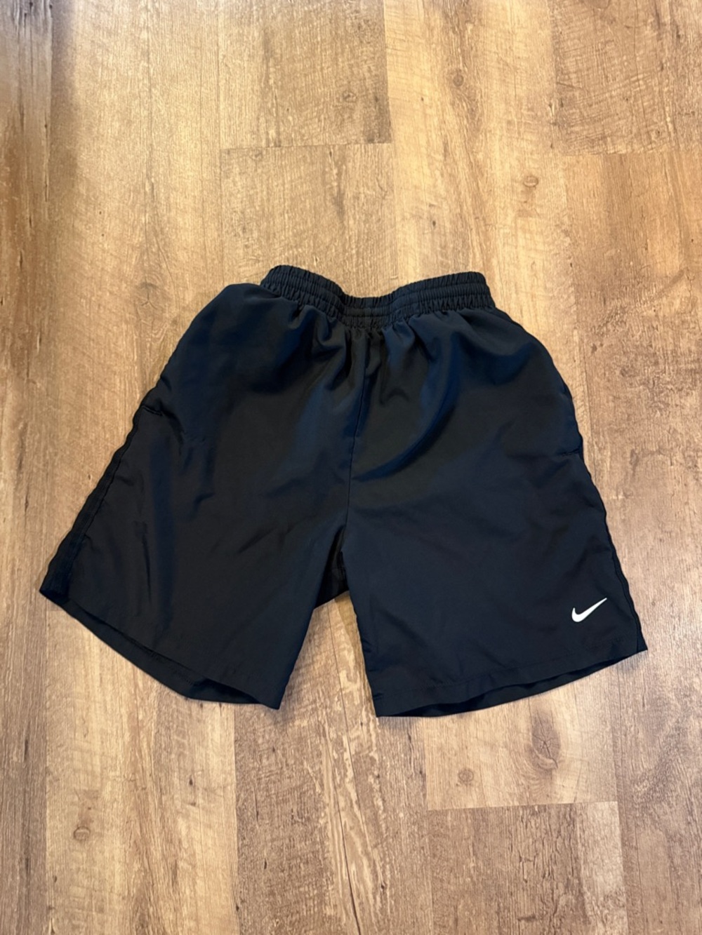 Nike Boy’s Black Athletic Shorts with White Swoosh Accent